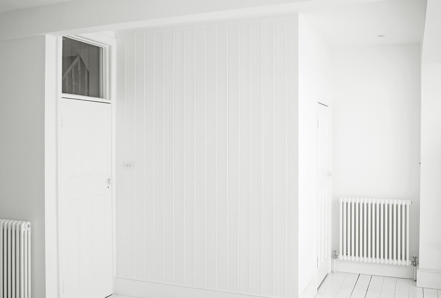 All White Boarded Studio House